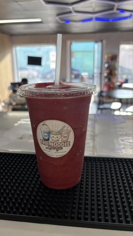 Berry smoothie under the lounge's hexagon LED lights